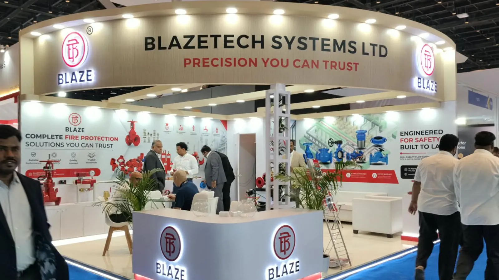 Blazetech Systems fire protection exhibition booth with curved wood-finish fascia