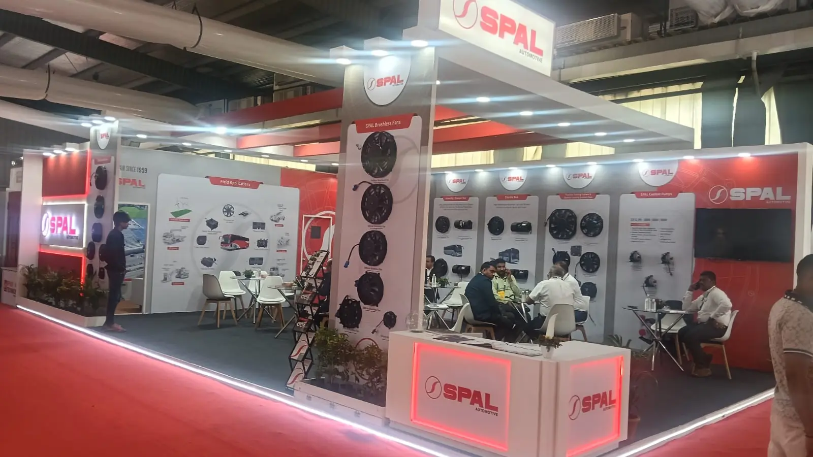 SPAL Automotive island exhibition booth with fan display tower and meeting area